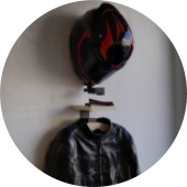Motorcycle helmet and gear racks