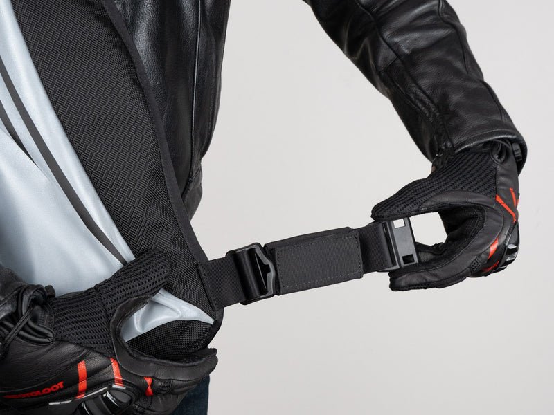 Tuck the strap tails